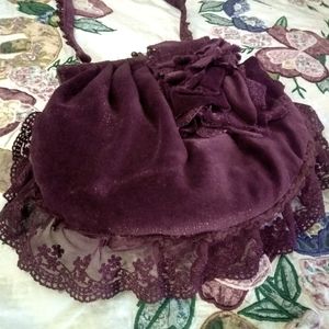 Velveteen fabric handbag.